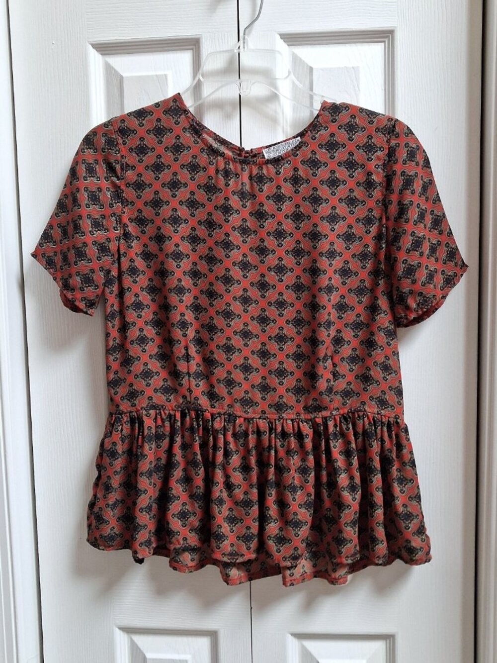 LUCCA COUTURE Medallion Orange/Black Open Back Peplum Top Blouse sz S